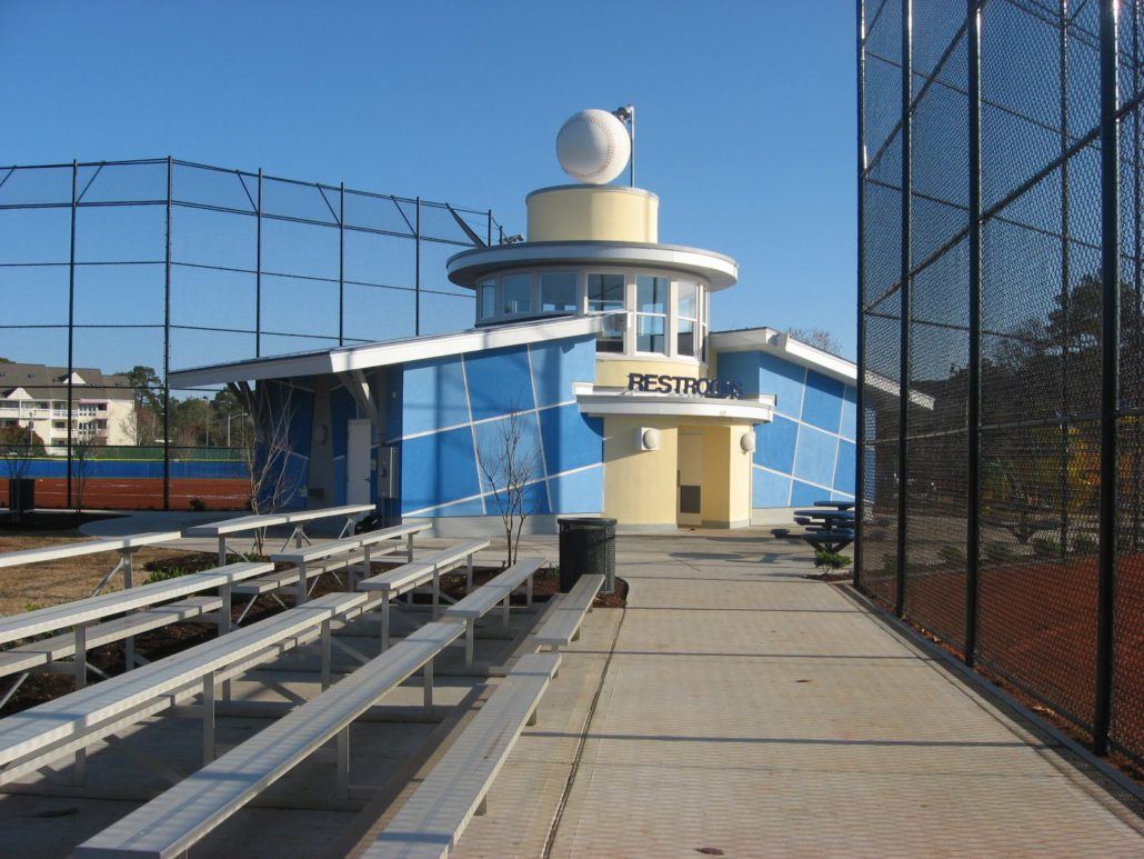 Restroom Complex with Bleachers in the Foreground